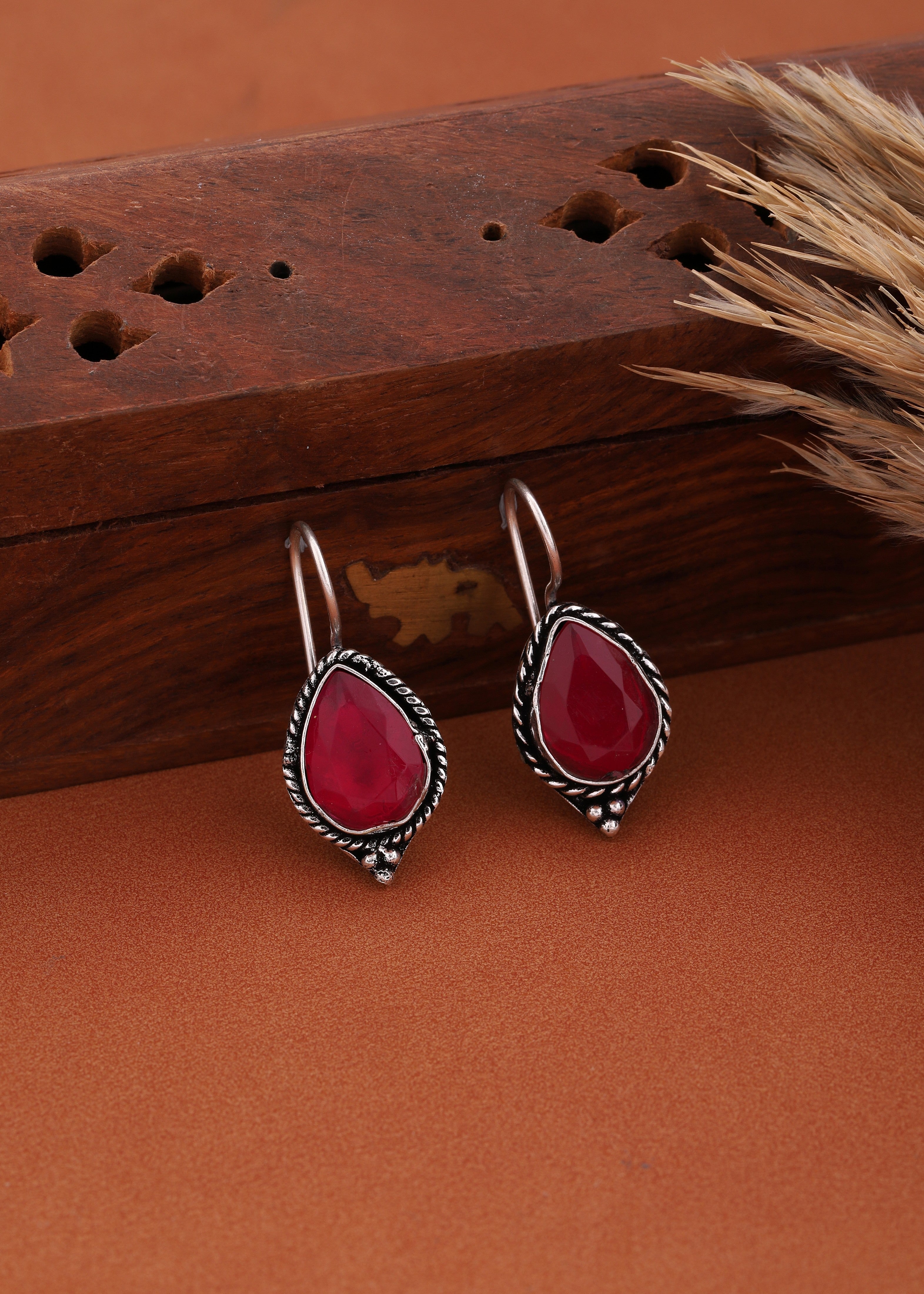 Silver-Toned Oxidized Traditional  Earrings With Red Stone