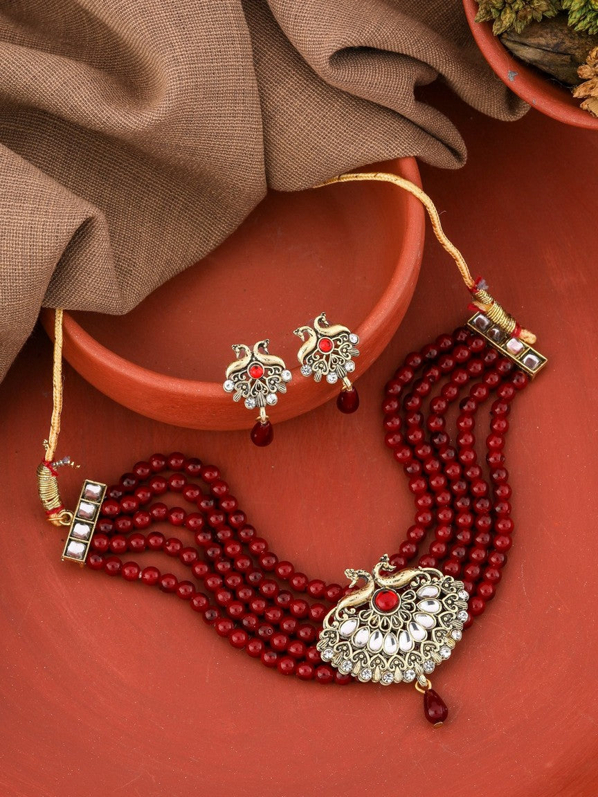 Red Kundan Beaded Peacock Shape Gold toned Choker Necklace With Earring