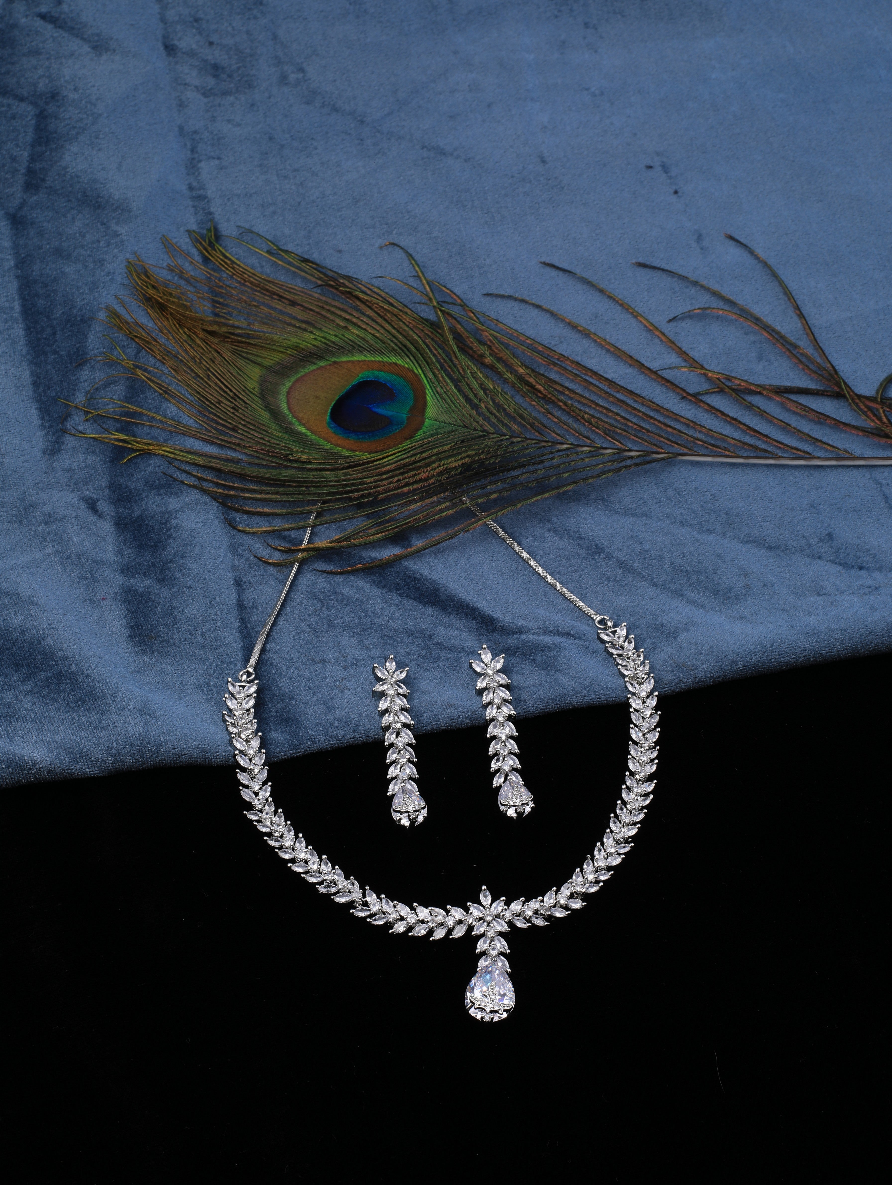 HEIDI DAUS Swarovski Crystal Aurora Borealis Peacock Feather Necklace -  Coach Luxury